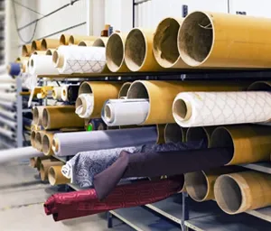 A row of cardboard tubes stacked