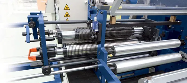 DUAL SPINDLE SLITTER REWINDER FOR NARROW WEB TBS