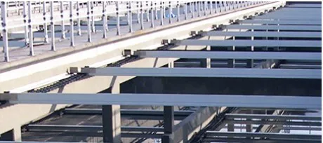 Sludge scrapers for rectangular tanks