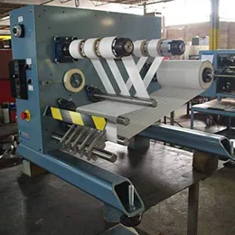 compact cantilevered slitter rewinder